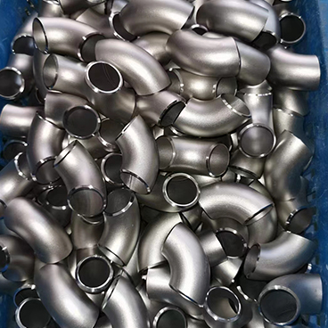 Welded pipe fittings