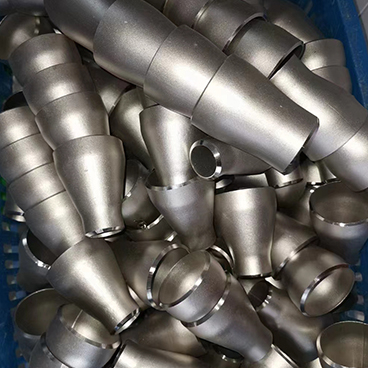 Welded pipe fittings