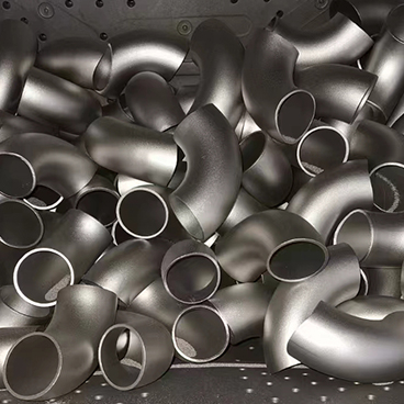 Welded pipe fittings